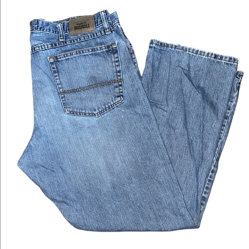These are Wrangler Original relaxed boot fit jeans.